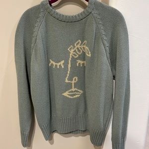 PacSun women’s sweater, with face design
